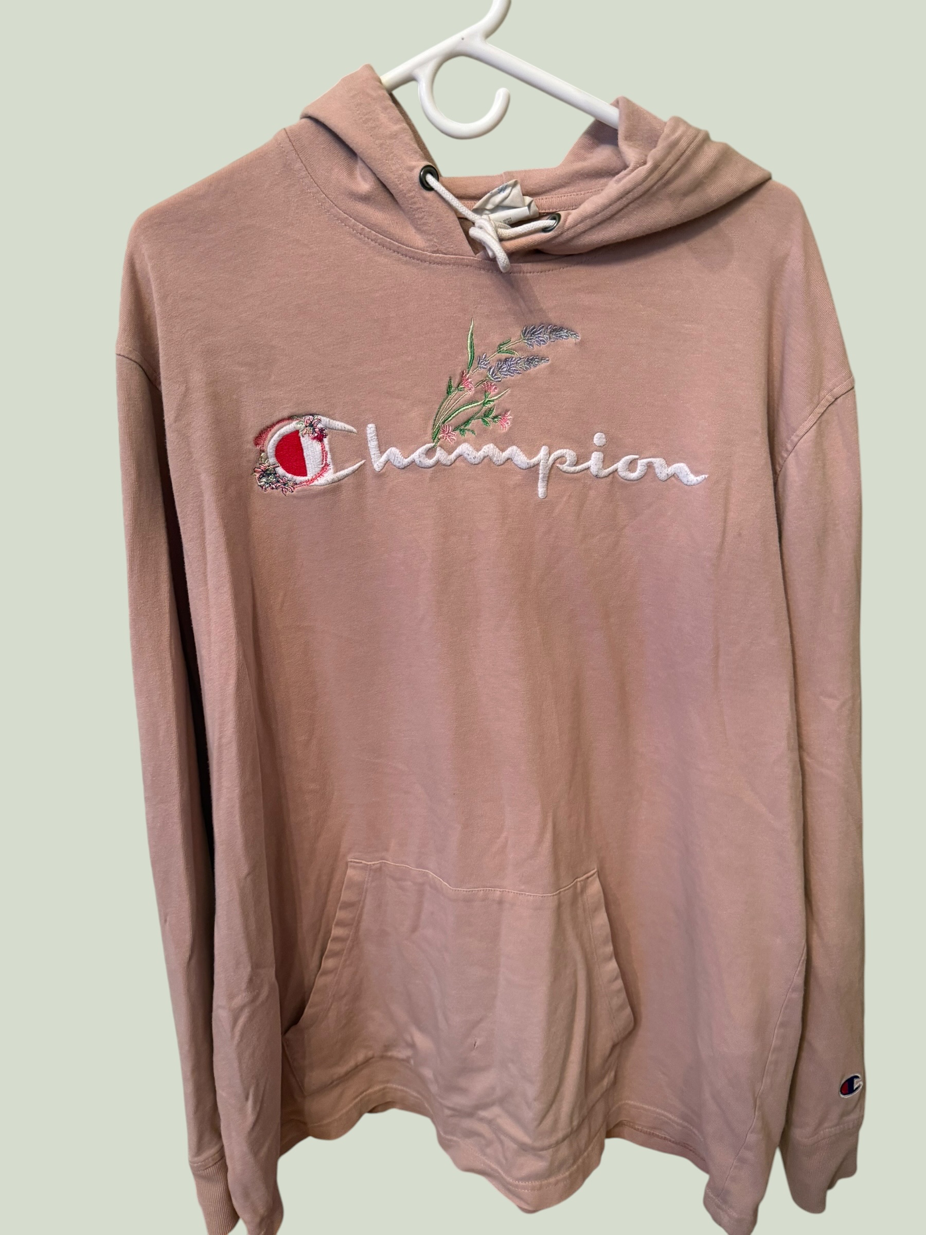 Light pink Champion spring hoodie with custom Norf embroidery, multiple angles