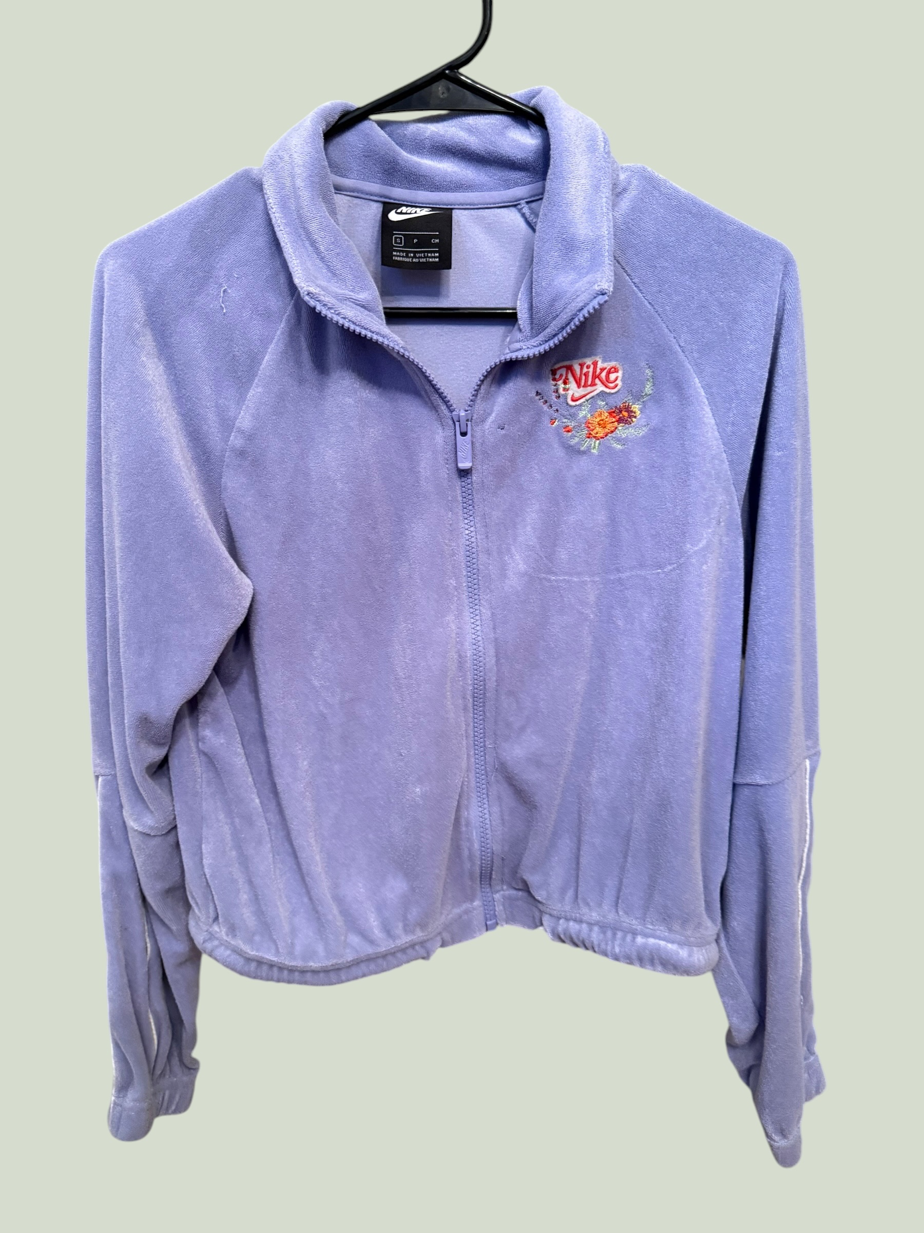 Light purple Nike zip-up sweatshirt with custom Norf embroidery, multiple angles