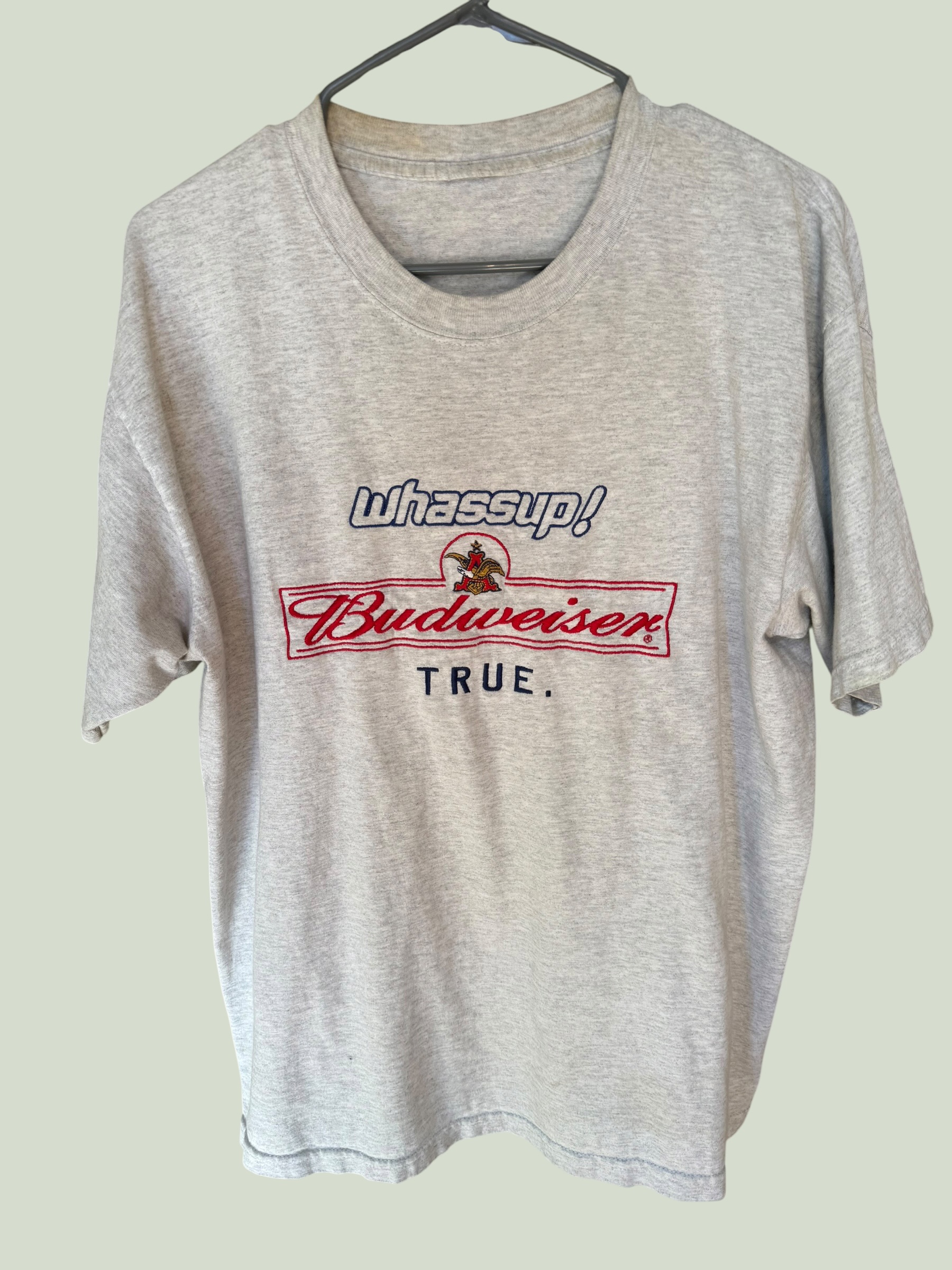 Natural white tee with custom Budweiser Wassup embroidery, multiple angles