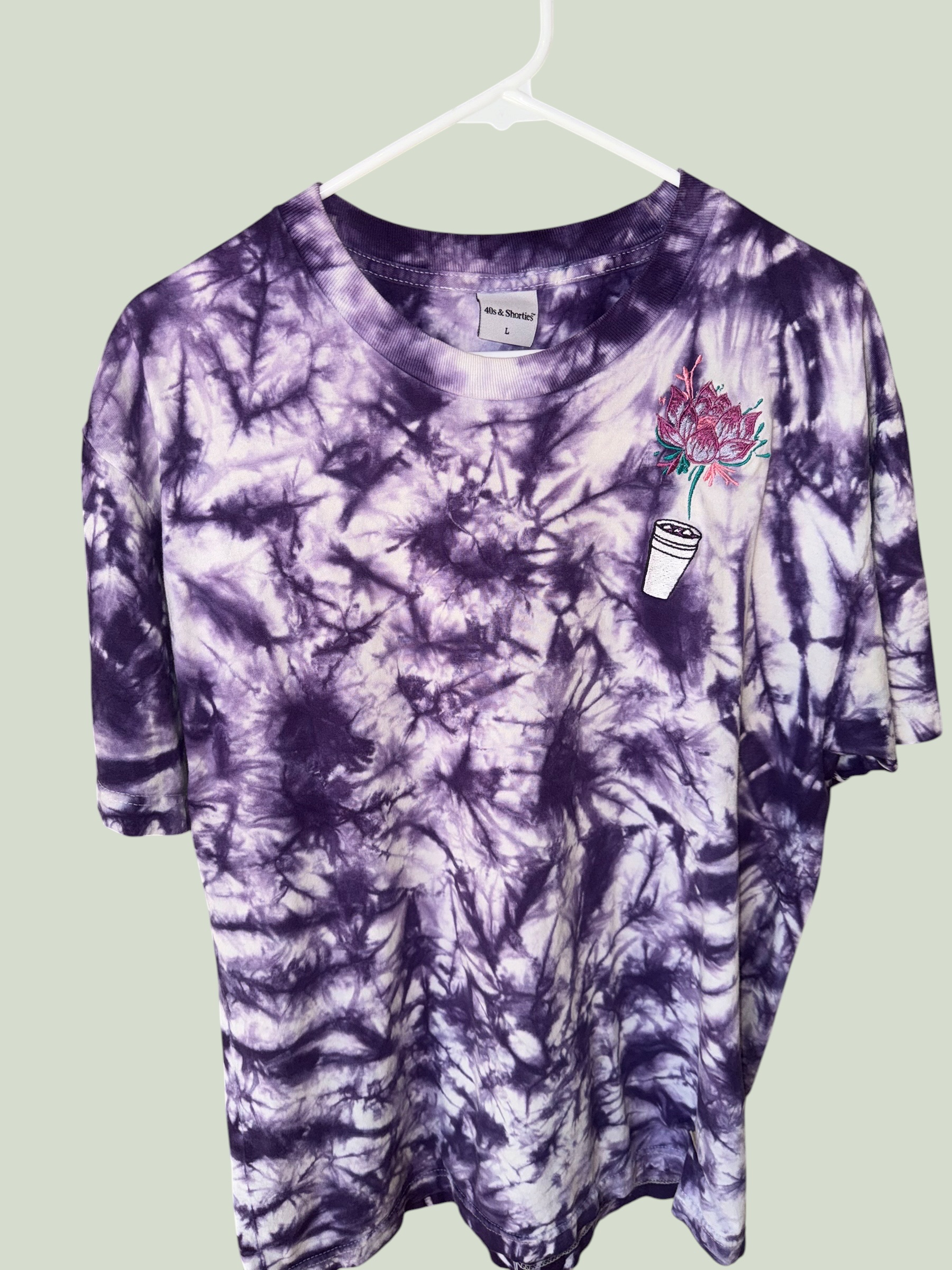 Purple tie-dye 40s & Shorties tee with custom lotus flower embroidery, multiple angles
