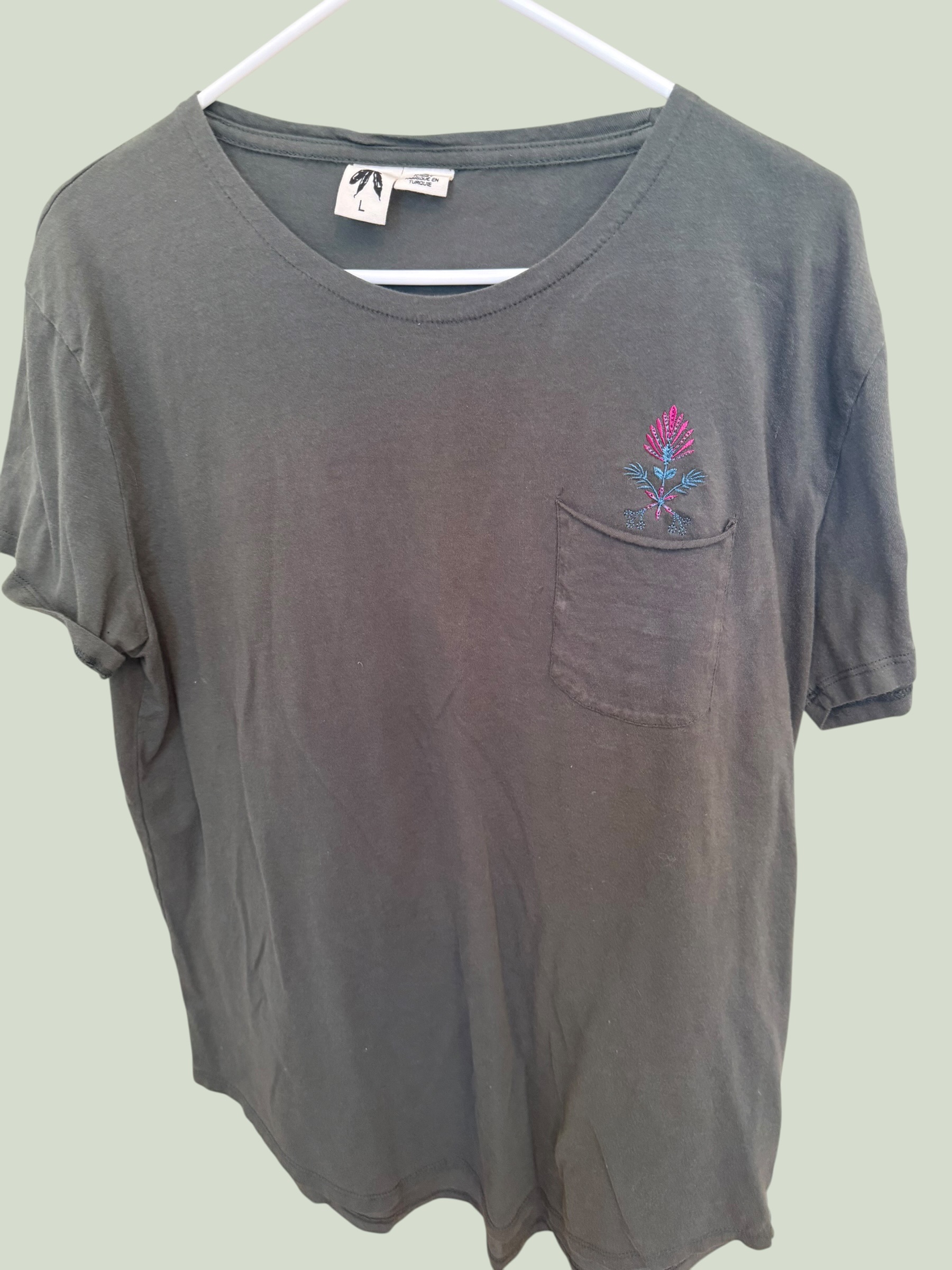 Forest green tee with custom embroidered pocket detail, multiple angles