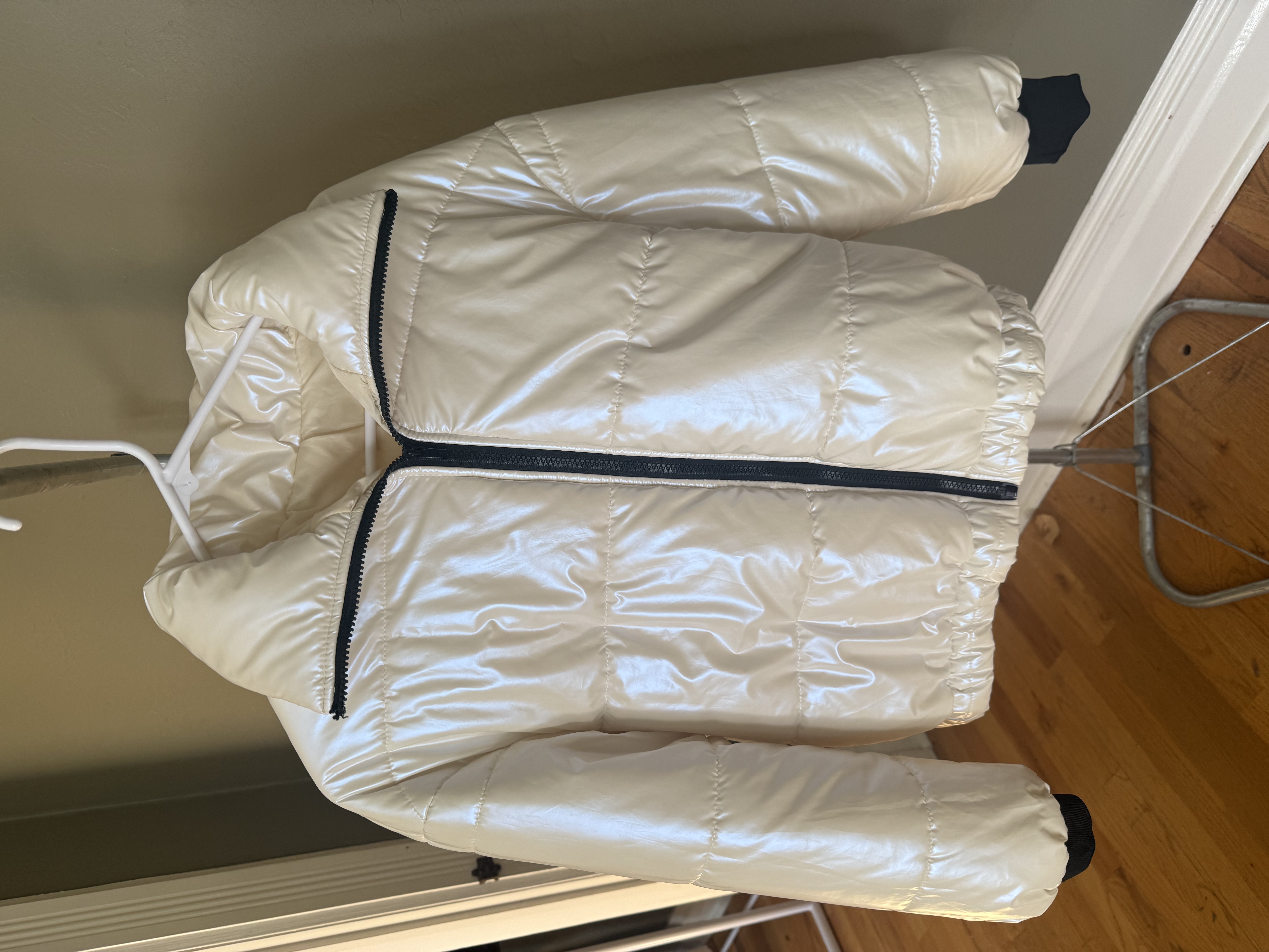 White front-zip winter puffer jacket, two angles