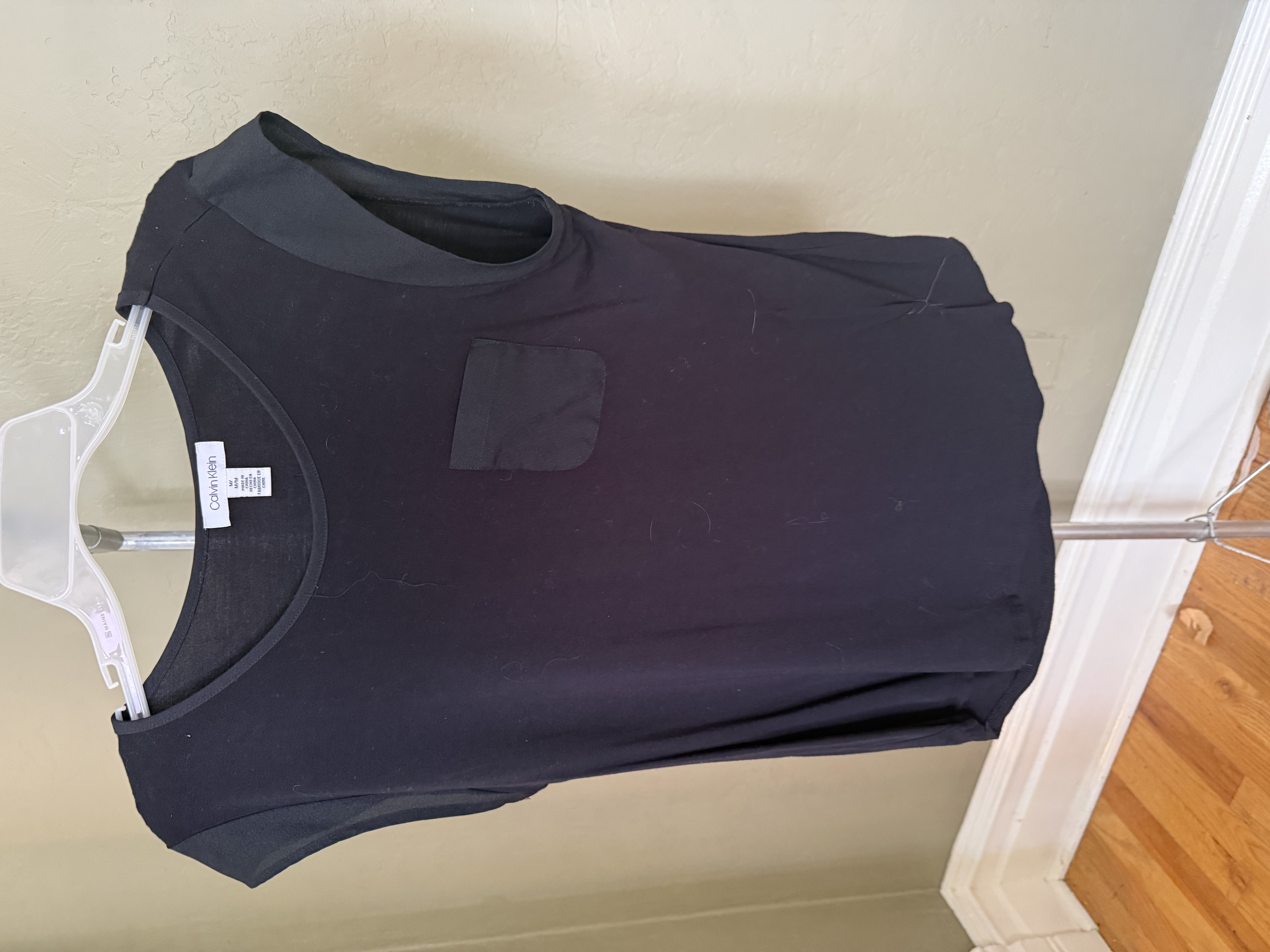 Calvin Klein black sleeveless top, multiple angles