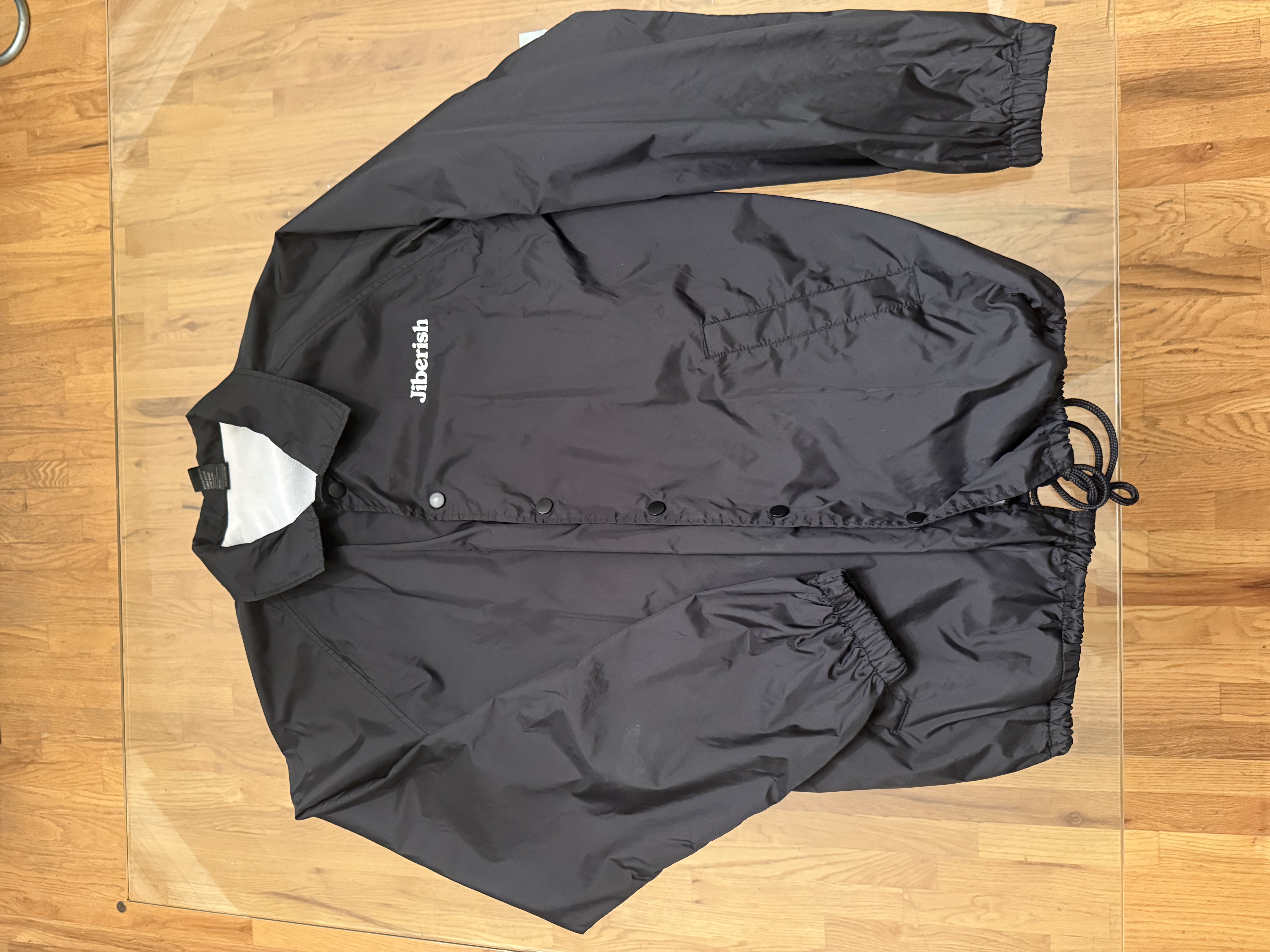 Jiberish Fill Your Cup black windbreaker, multiple angles